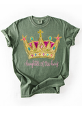 Green t-shirt with a colorful crown graphic and 'Daughter of the King' text on a white background